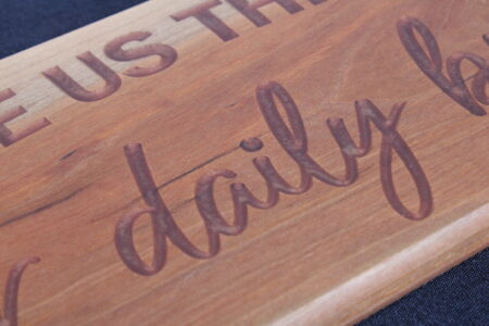 "Give Us This Day our Daily Bread" -Board